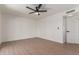 Simple bedroom with ceiling fan and ample closet space at 1413 N Sunview Pkwy, Gilbert, AZ 85234