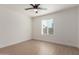 Bright bedroom with wood-look floors and window at 1413 N Sunview Pkwy, Gilbert, AZ 85234