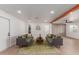 Living room with two gray couches and a green area rug at 1413 N Sunview Pkwy, Gilbert, AZ 85234