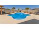 Relaxing kidney-shaped pool in backyard at 1413 N Sunview Pkwy, Gilbert, AZ 85234