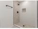 Clean shower with mosaic tile and a modern shower fixture at 1413 N Sunview Pkwy, Gilbert, AZ 85234