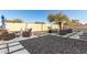 Backyard with patio, seating area, and gravel at 15446 W Montecito Ave, Goodyear, AZ 85395