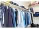 Well-organized closet with hanging rods and shelves at 15446 W Montecito Ave, Goodyear, AZ 85395