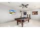 Game room with a pool table and plenty of space at 15446 W Montecito Ave, Goodyear, AZ 85395