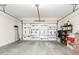 Garage with storage shelving and ample space at 15446 W Montecito Ave, Goodyear, AZ 85395