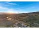 Stunning aerial view showcasing the community and mountain backdrop at 15632 S 6Th St, Phoenix, AZ 85048