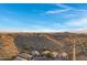 Aerial view of a residential area situated on a hill overlooking a vast landscape at 15632 S 6Th St, Phoenix, AZ 85048