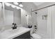 Clean bathroom with white subway tile and black fixtures at 15632 S 6Th St, Phoenix, AZ 85048