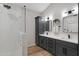 Elegant bathroom with double vanity, large shower, and modern fixtures at 15632 S 6Th St, Phoenix, AZ 85048