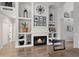 Living room fireplace with built-in shelving and decorative accents at 15632 S 6Th St, Phoenix, AZ 85048