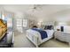 Spacious bedroom with a white bed frame and blue accents at 15801 N 51St St, Scottsdale, AZ 85254