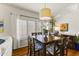 Bright dining room with square table and six chairs at 15801 N 51St St, Scottsdale, AZ 85254