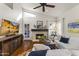 Bright living room with hardwood floors, fireplace, and comfortable seating at 15801 N 51St St, Scottsdale, AZ 85254