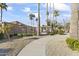 Curving walkway leading to the community pool area at 15801 N 51St St, Scottsdale, AZ 85254