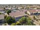 Aerial view of house showcasing backyard and landscaping at 16220 W Red Rock Dr, Surprise, AZ 85374