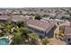 Aerial view of house showcasing backyard patio and pool at 16220 W Red Rock Dr, Surprise, AZ 85374