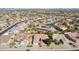 Aerial view of house with pool in a residential area at 16220 W Red Rock Dr, Surprise, AZ 85374