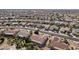 Aerial view of neighborhood with houses and a golf course at 16220 W Red Rock Dr, Surprise, AZ 85374