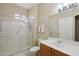 Clean bathroom, shower stall, toilet and vanity with sink at 16220 W Red Rock Dr, Surprise, AZ 85374