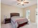 Bedroom with double bed, nightstand and ensuite bathroom at 16220 W Red Rock Dr, Surprise, AZ 85374