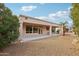 Single story house with covered patio and desert landscaping at 16220 W Red Rock Dr, Surprise, AZ 85374