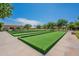 Well-maintained lawn bowling area, providing an ideal space for outdoor recreation and leisurely activities at 16639 W Pinchot Ave, Goodyear, AZ 85395