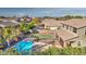 Aerial view showing a house with a pool and a large backyard at 1811 E Powell Way, Chandler, AZ 85249