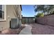 Landscaped backyard with storage shed and pathway at 1811 E Powell Way, Chandler, AZ 85249