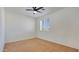 Spacious bedroom featuring a ceiling fan and large window with shutters at 1811 E Powell Way, Chandler, AZ 85249