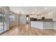 Kitchen with island, stainless steel appliances, and white cabinets at 1811 E Powell Way, Chandler, AZ 85249