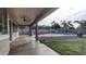 Covered patio with ceiling fan overlooking the backyard pool at 1811 E Powell Way, Chandler, AZ 85249