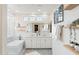 Spa-like bathroom with double vanity and a large soaking tub at 18140 N 92Nd St, Scottsdale, AZ 85255