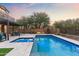 Stunning pool and spa with pergola and patio seating at 18140 N 92Nd St, Scottsdale, AZ 85255