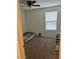 Bedroom featuring neutral carpet, a window, and natural light at 18225 W Yavapai St, Goodyear, AZ 85338