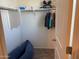 Neatly organized closet with hanging rods and shelves at 18225 W Yavapai St, Goodyear, AZ 85338