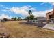 Large backyard with patio furniture and a shed at 18509 W Bethany Home Rd, Litchfield Park, AZ 85340