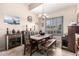 Rustic dining area with wooden table and chairs at 18509 W Bethany Home Rd, Litchfield Park, AZ 85340