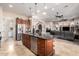 Spacious kitchen featuring an island, stainless steel appliances, and ample cabinetry at 18509 W Bethany Home Rd, Litchfield Park, AZ 85340