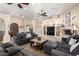 Open living area featuring a fireplace and built-in entertainment center at 18509 W Bethany Home Rd, Litchfield Park, AZ 85340