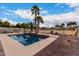 Relaxing pool area with patio furniture and a large backyard at 18509 W Bethany Home Rd, Litchfield Park, AZ 85340