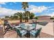 Relaxing poolside patio furniture with a view of the pool and landscape at 18509 W Bethany Home Rd, Litchfield Park, AZ 85340