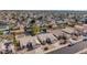 Aerial view of houses in a residential neighborhood with pools and yards at 19045 N 47Th Cir, Glendale, AZ 85308