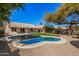 Large backyard with a beautiful pool and lush lawn at 19045 N 47Th Cir, Glendale, AZ 85308