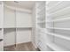 Large walk-in closet with shelving and hanging rods at 19045 N 47Th Cir, Glendale, AZ 85308