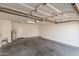 Attached garage with open ceiling and ample space at 19045 N 47Th Cir, Glendale, AZ 85308