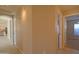 Spacious hallway with views into other rooms of the house at 19045 N 47Th Cir, Glendale, AZ 85308