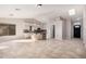 Open kitchen features island, granite countertops, and stainless steel appliances at 19045 N 47Th Cir, Glendale, AZ 85308