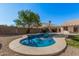 Relaxing kidney-shaped pool with ample surrounding space at 19045 N 47Th Cir, Glendale, AZ 85308