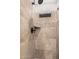 Shower stall with tiled walls and a built-in shelf at 19045 N 47Th Cir, Glendale, AZ 85308