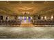 Large ballroom with hardwood floors and ample seating at 2005 N 169Th Ave, Goodyear, AZ 85395